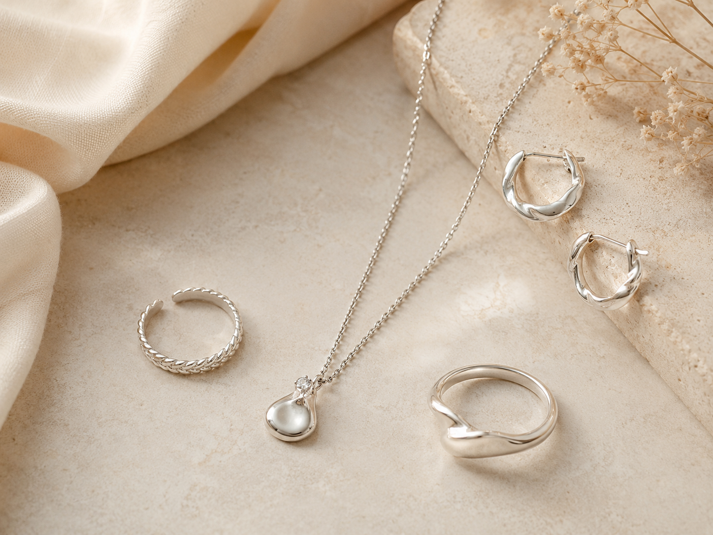 For daily silver jewelry, restraint usually lasts longer